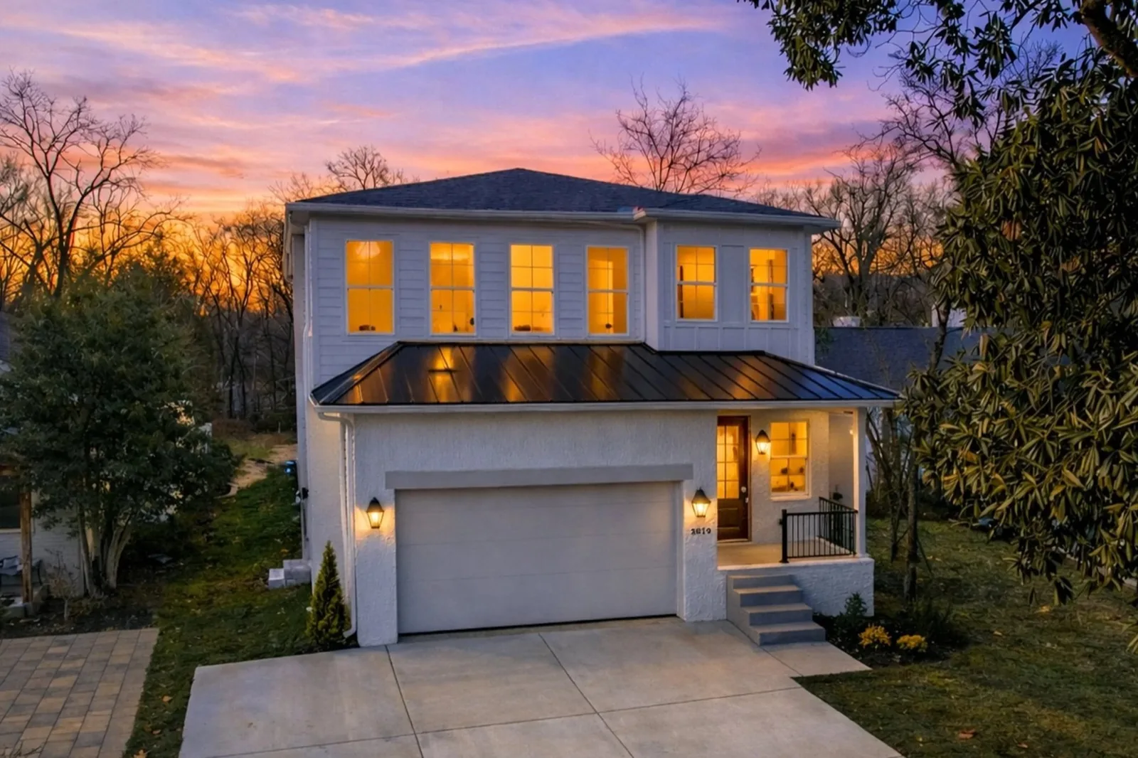 New custom home in Green Hills at sunset